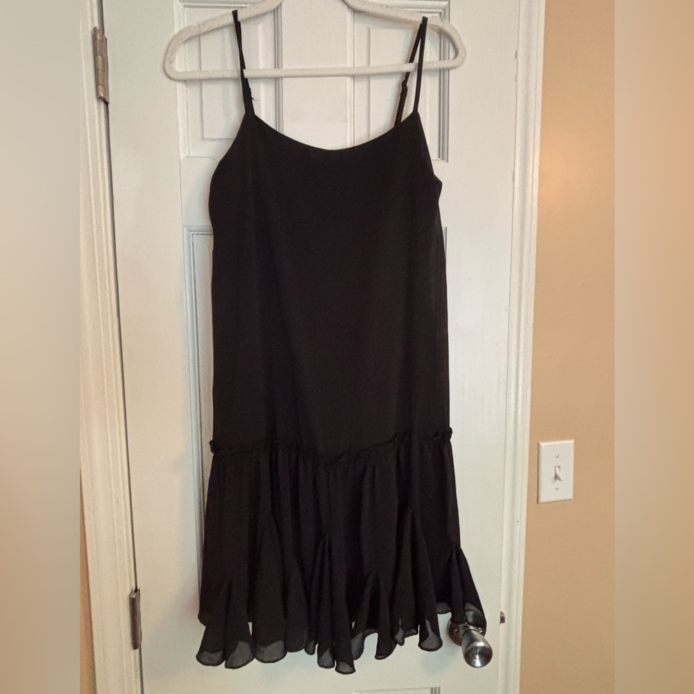 Black Sleeveless Dress with Ruffle Hem